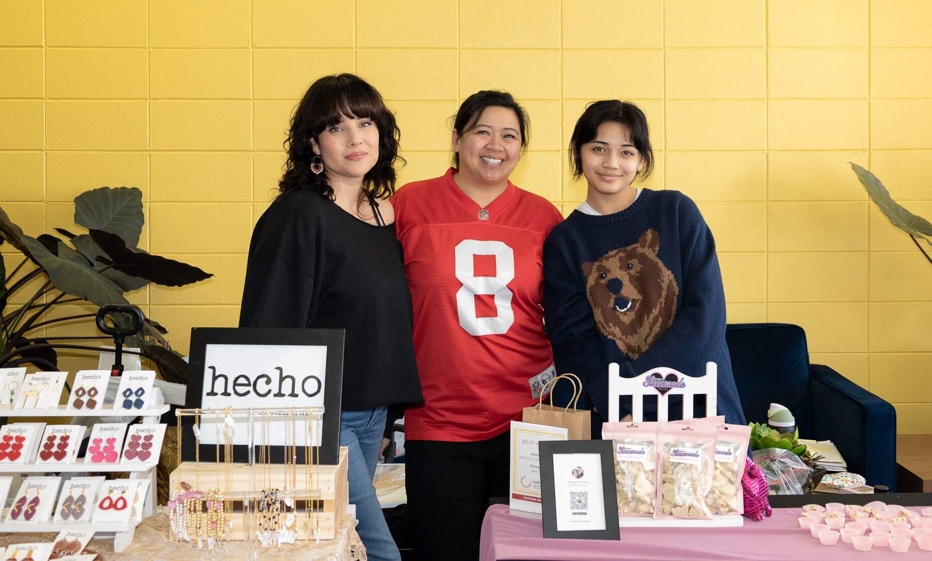 vendors showing goods at a pop-up market